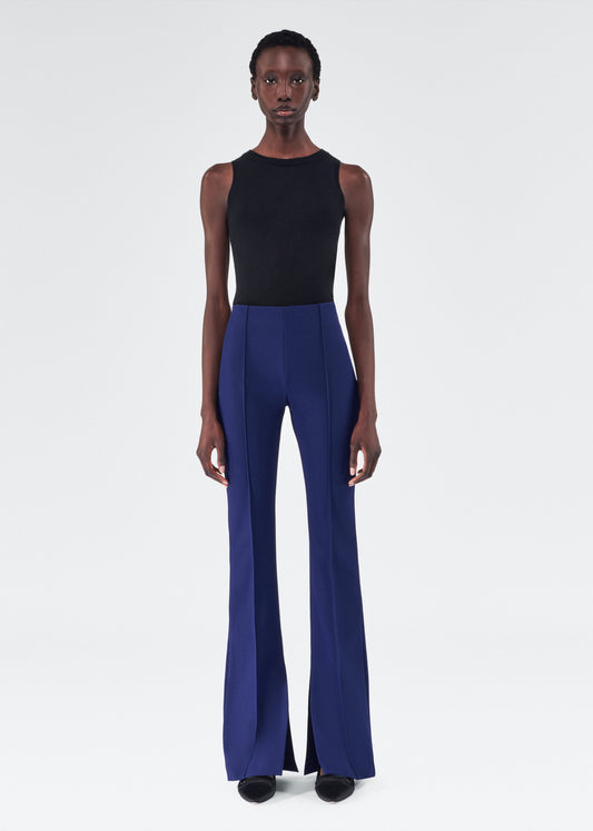 model wearing the adam lippes eva flare pant in navy