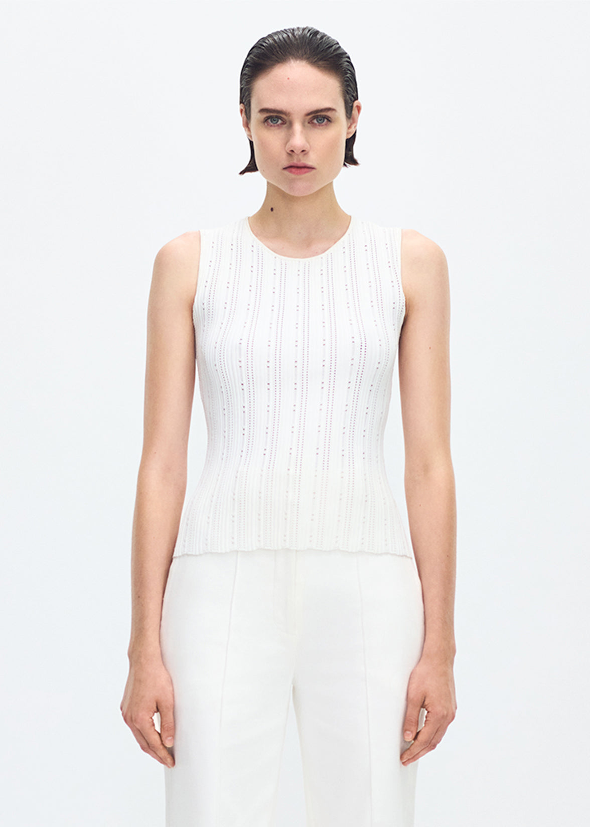 front profile of model wearing the brynn top in compact jacquard ivory
