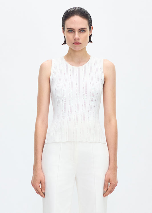 front profile of model wearing the brynn top in compact jacquard ivory
