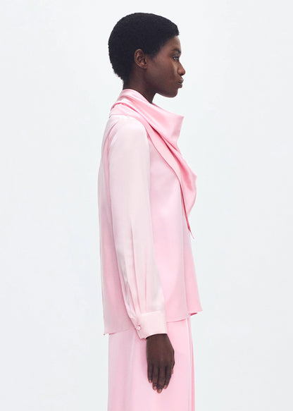 Model wearing the Bandera Blouse in Silk Charmeuse in Pink 