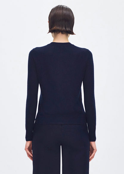 back profile of model wearing the didion knit in navy