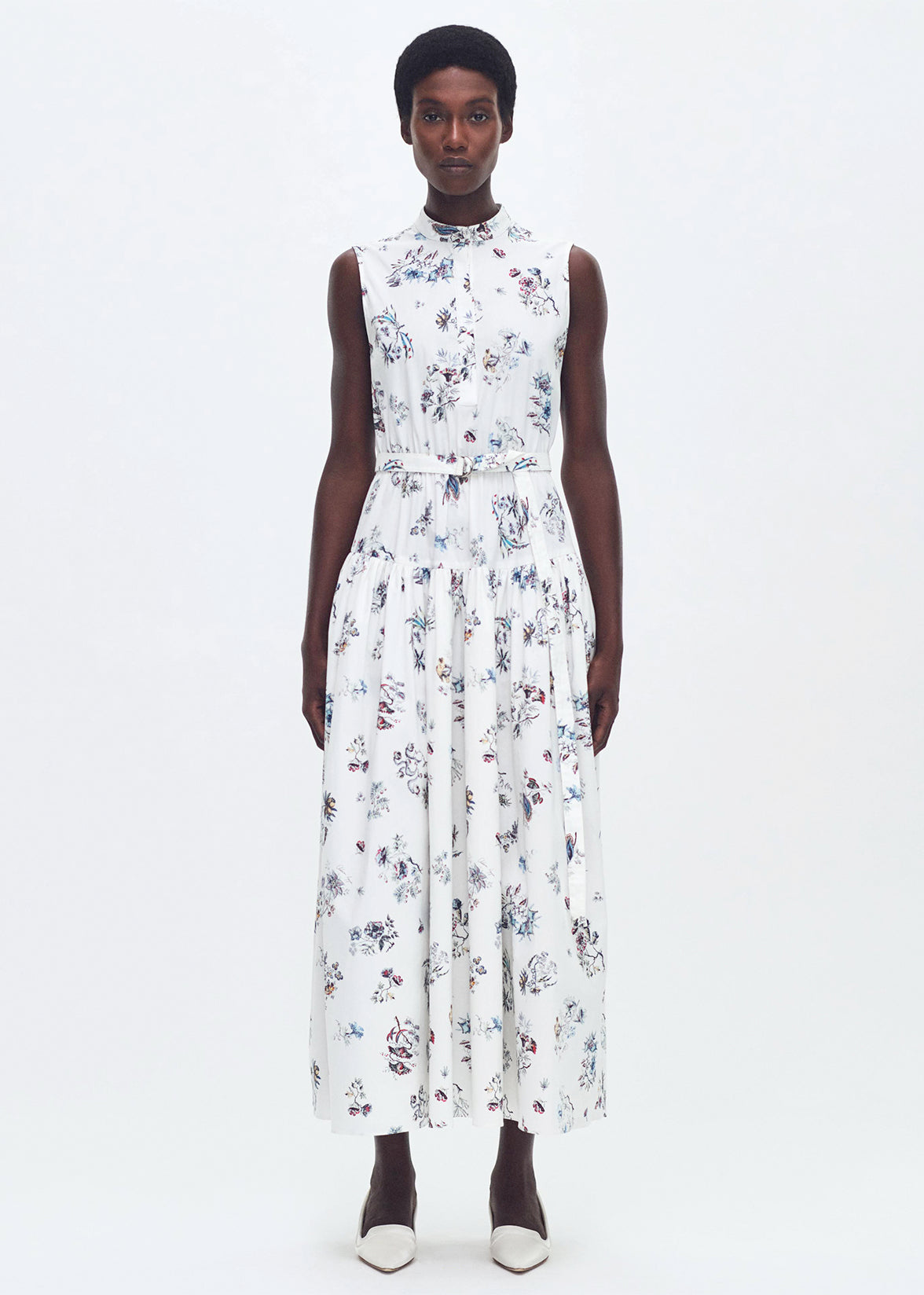 front profile of model wearing the arden dress in printed poplin in ivory floral