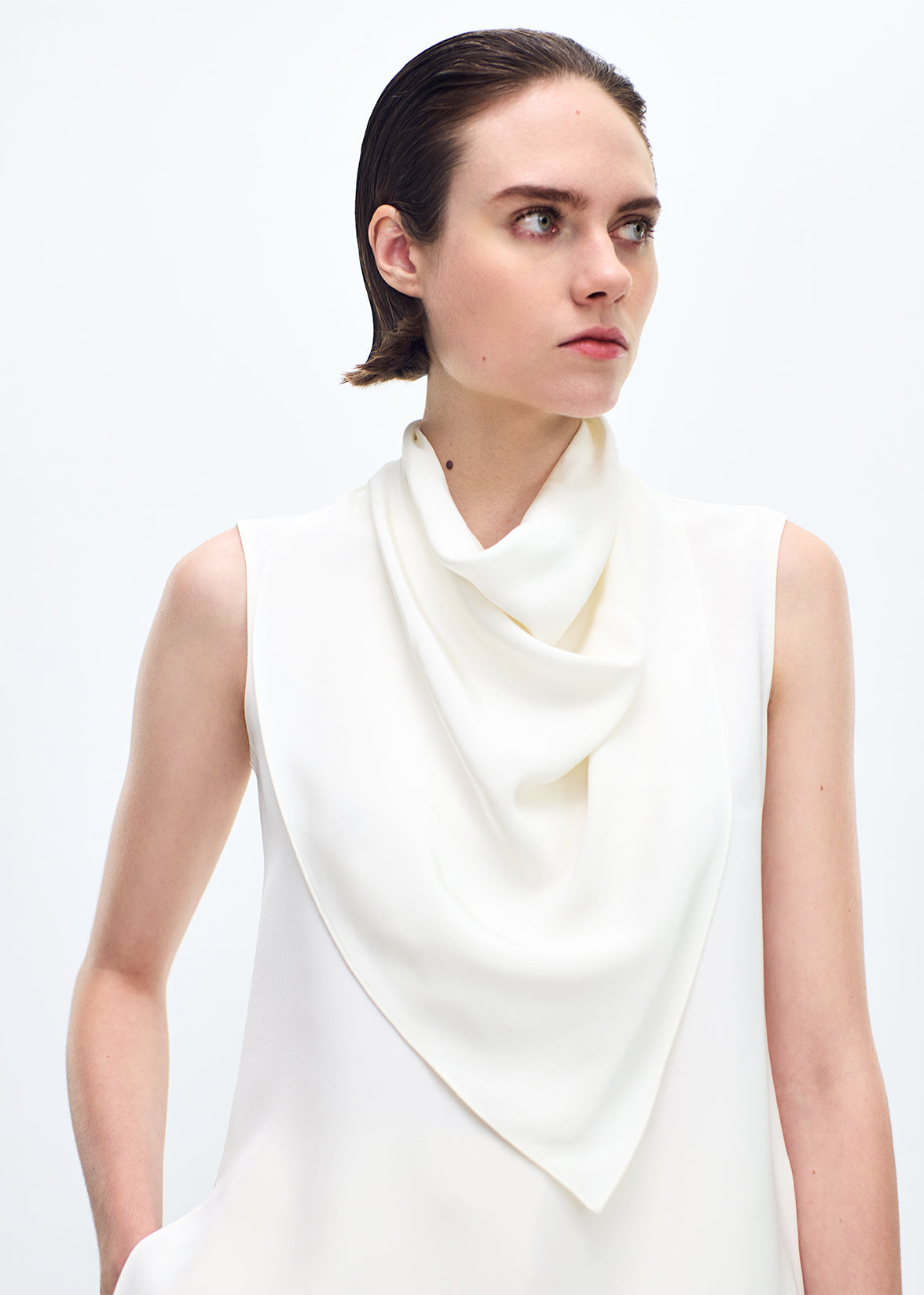 close up of front body front profile of model wearing the Bandera Shell in Silk Crepe in Ivory