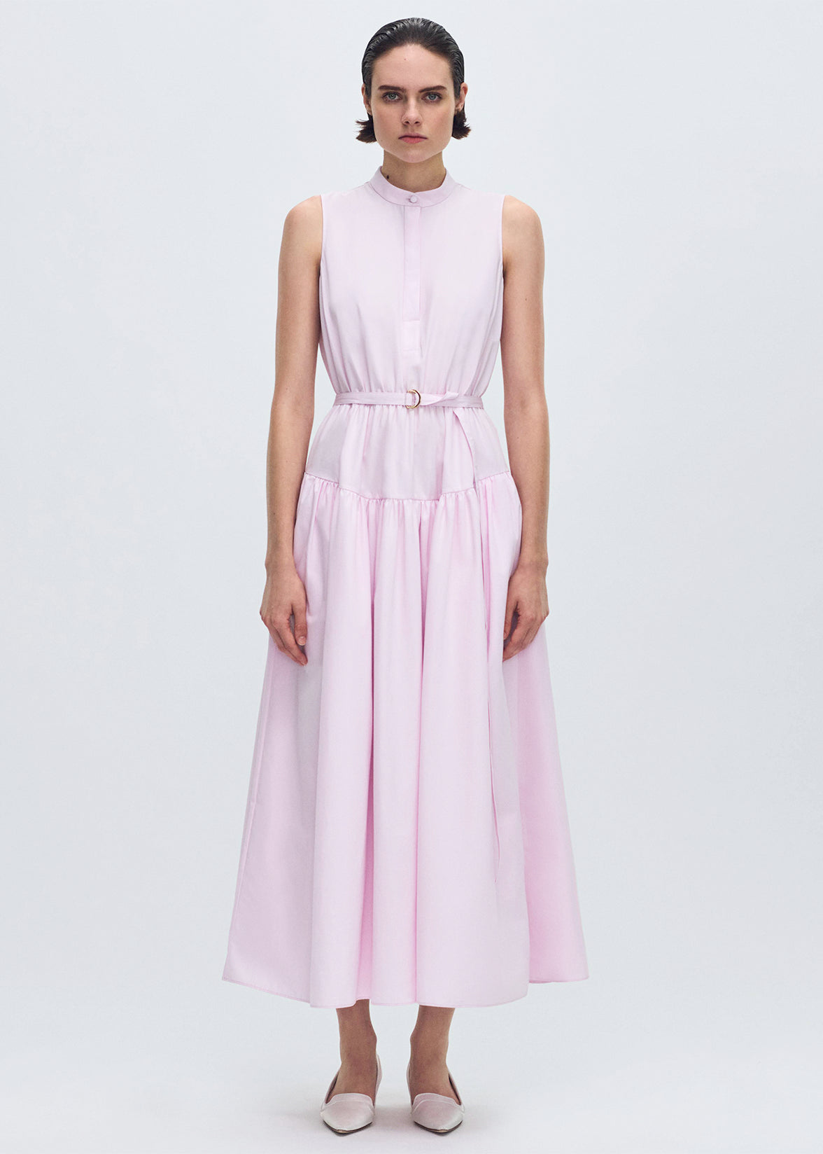 front profile of model wearing the Arden Dress in Compact Cotton in Pale Pink