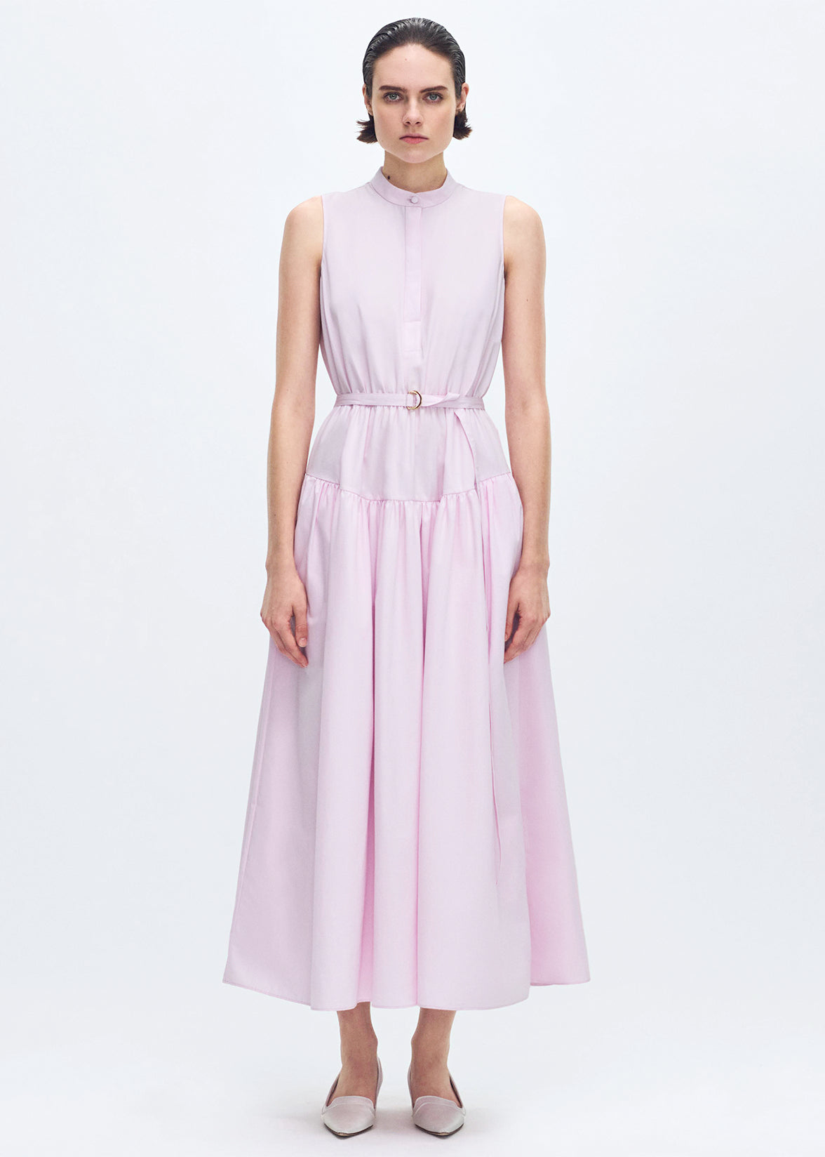 front profile of model wearing the Arden Dress in Compact Cotton in Pale Pink