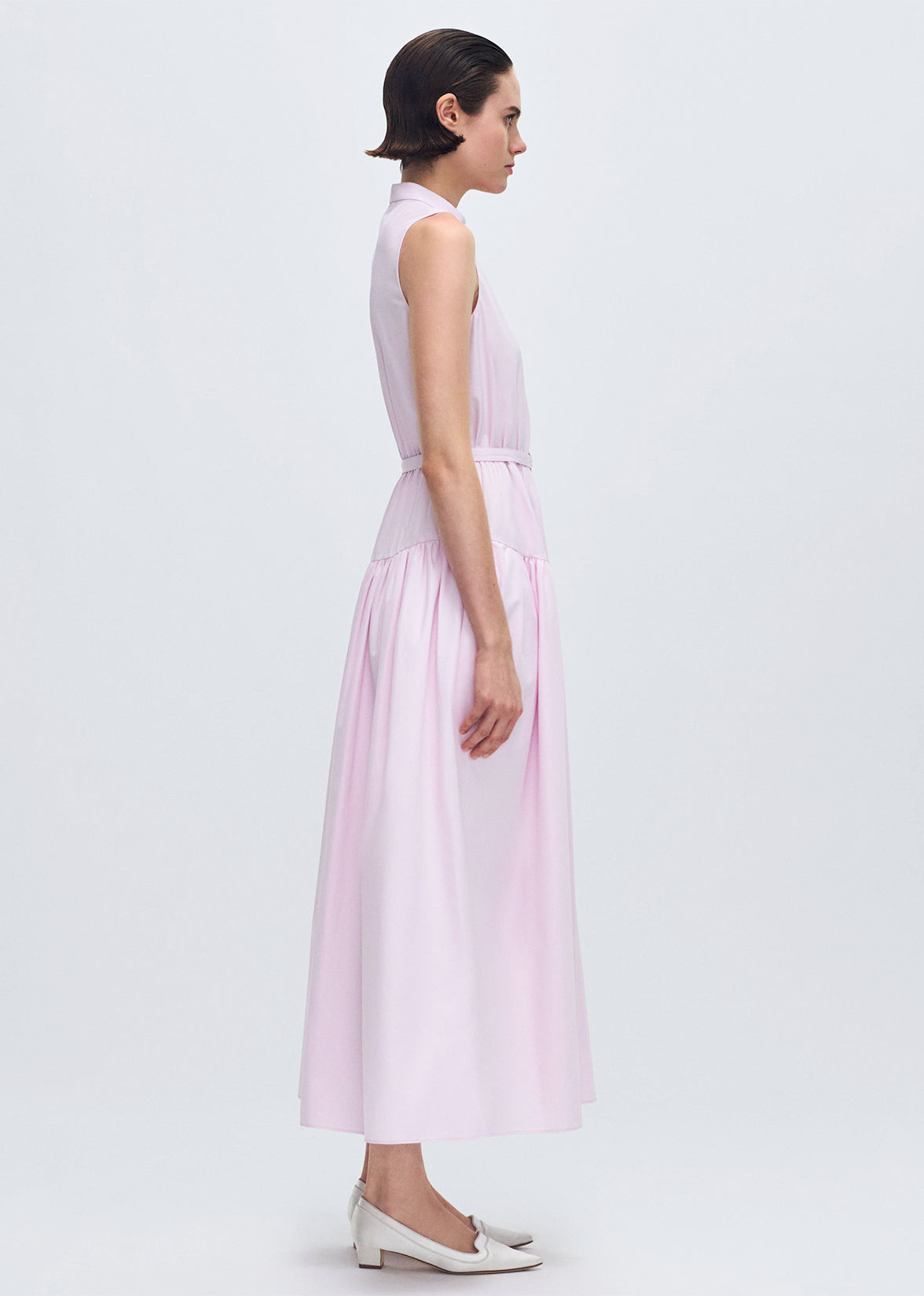 side profile of model wearing the Arden Dress in Compact Cotton in Pale Pink