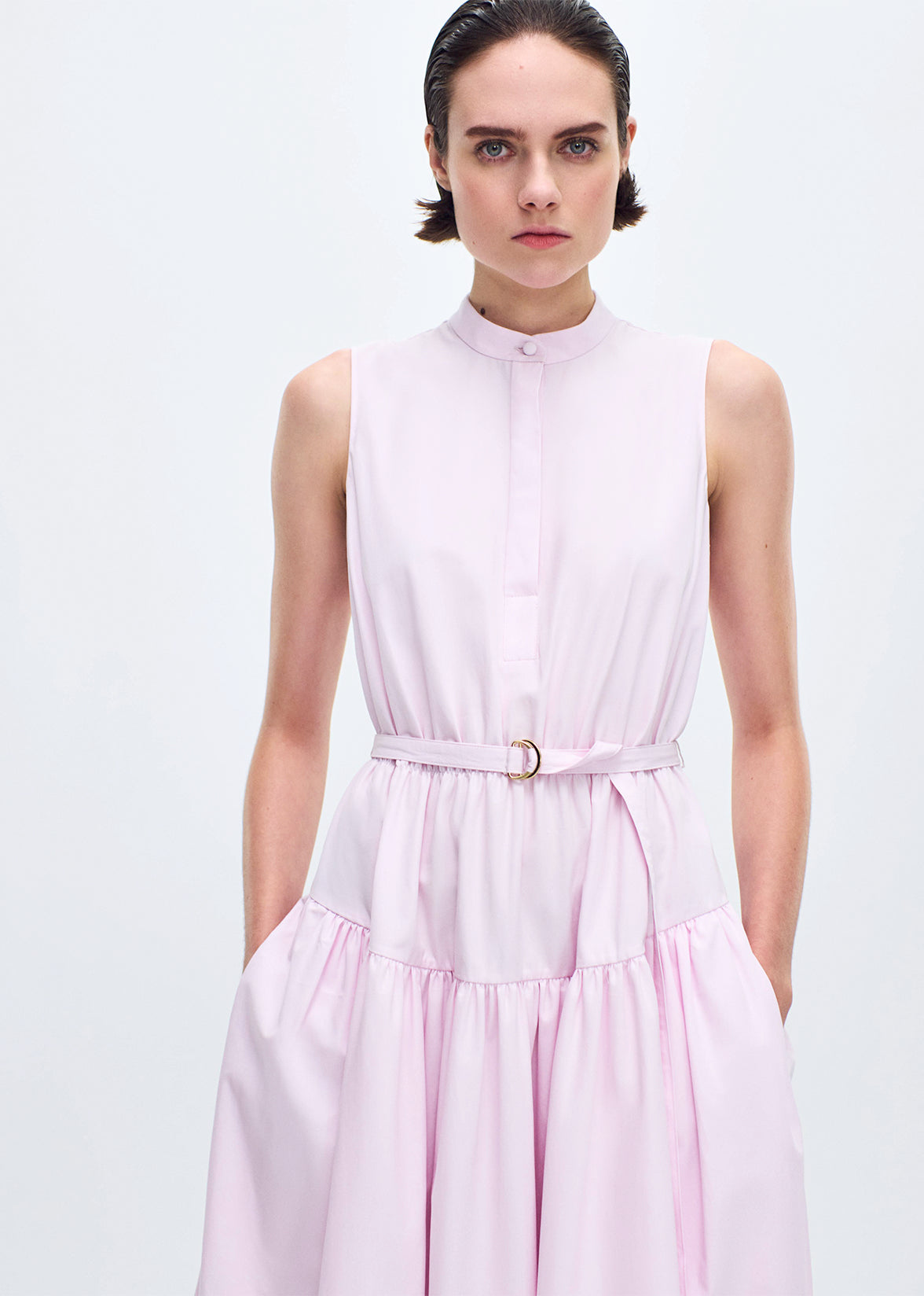 close up of model wearing the Arden Dress in Compact Cotton in Pale Pink