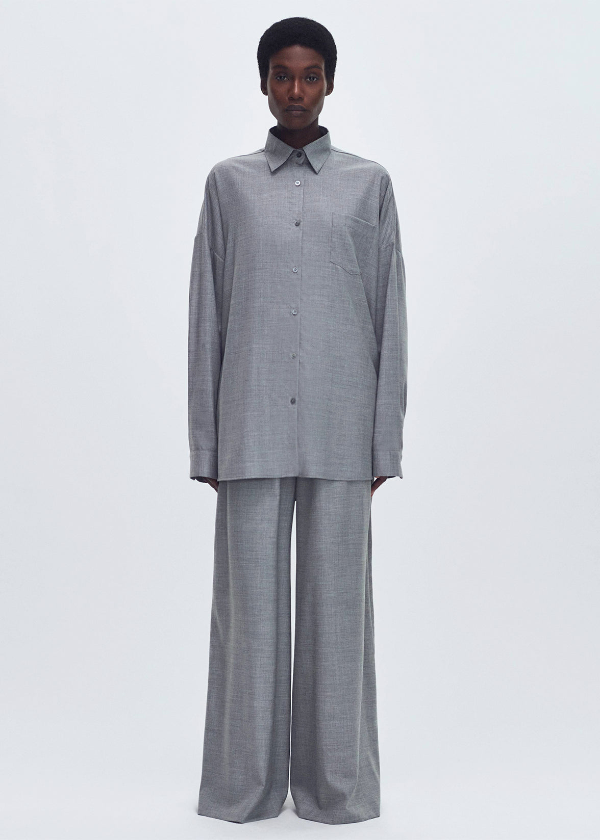 Front Full Body Profile of model wearing the Perrine Shirt in Fine Cashmere Suiting in Grey