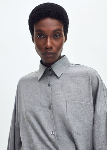 Close up of model wearing the Perrine Shirt in Fine Cashmere Suiting in Grey