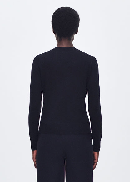 back profile of model wearing the Didion Knit in Cashmere in black