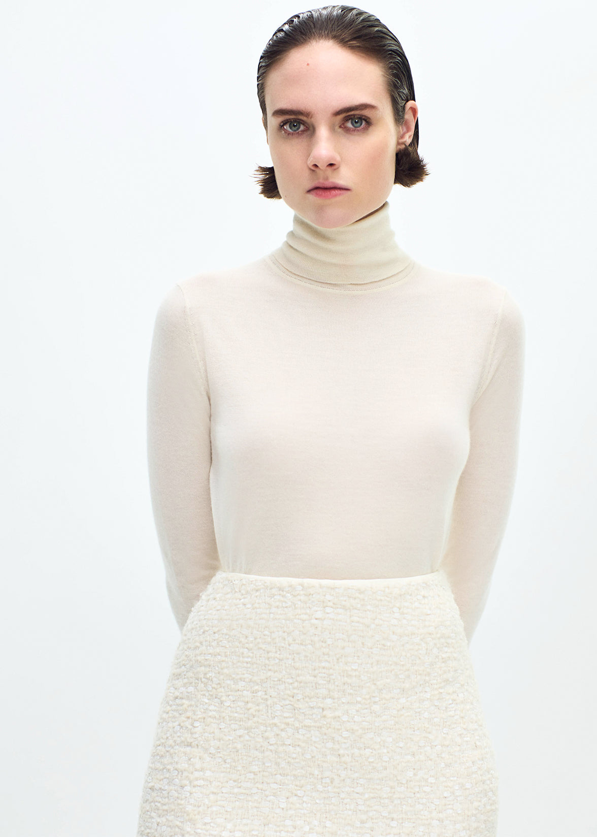 close up of model wearing the Blair Skirt in Tweed in Ivory