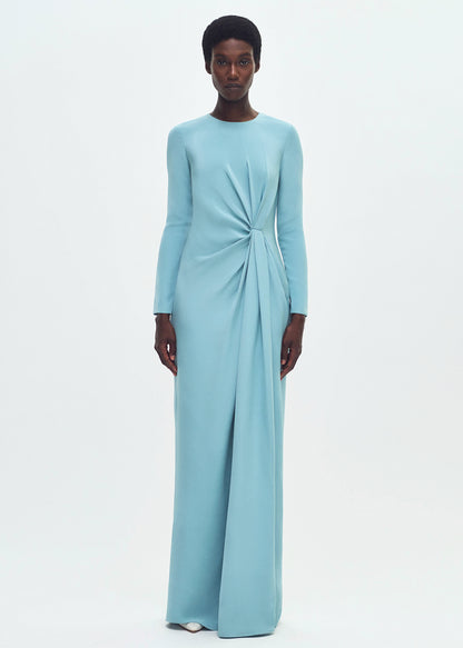 front profile of model wearing the long draped dress in silk crepe in mist