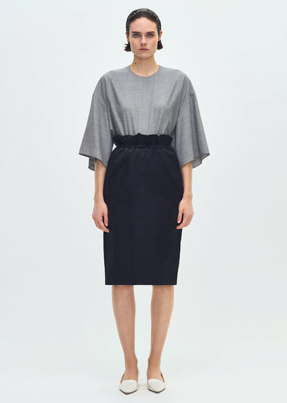 Front profile of model wearing the Sullivan Skirt in Silk Cotton Duchesse