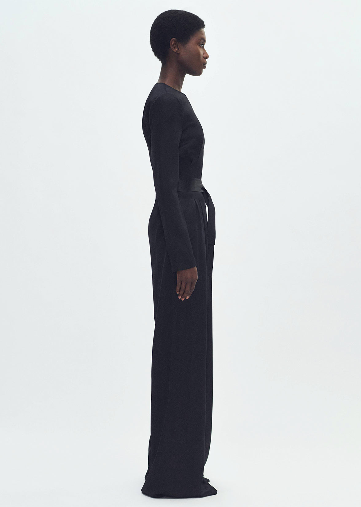 side profile of model wearing  the Ophelia Jumpsuit in Double Face Silk Charmeuse