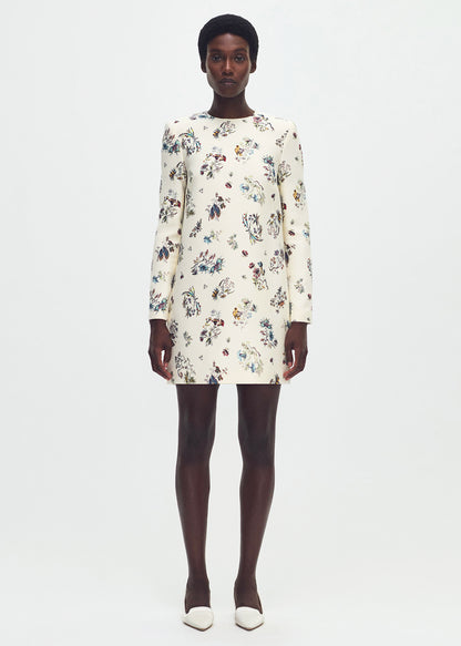 front profile of model wearing  the tilley dress in printed silk wool ivory floral