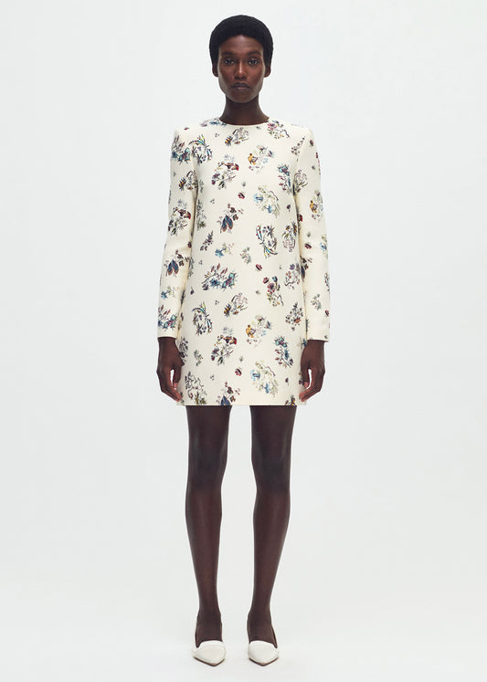 front profile of model wearing  the tilley dress in printed silk wool ivory floral