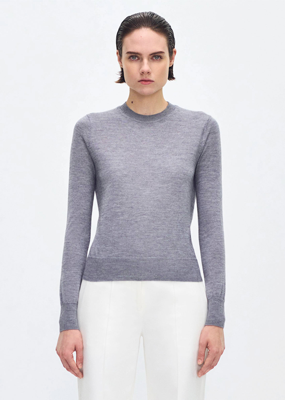 front profile of model wearing the Didion knit in cashmere silk in grey