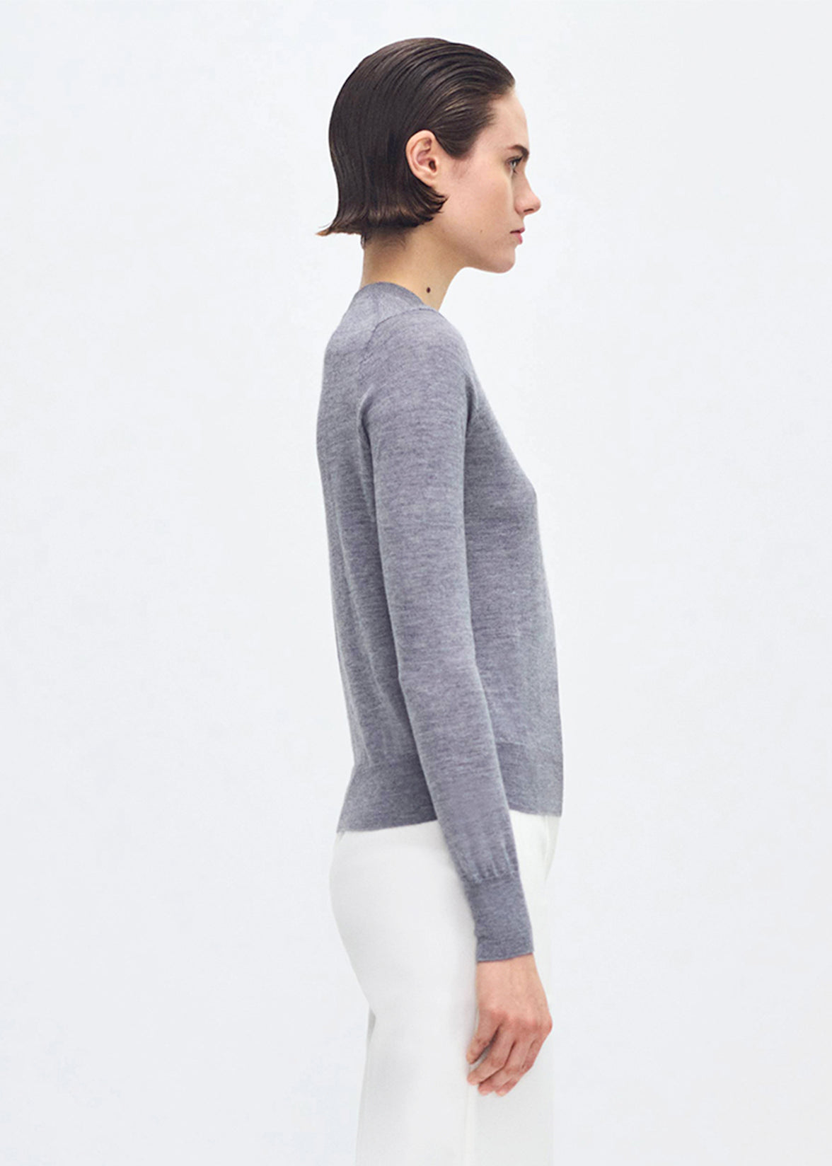 side profile of model wearing the Didion knit in cashmere silk in grey