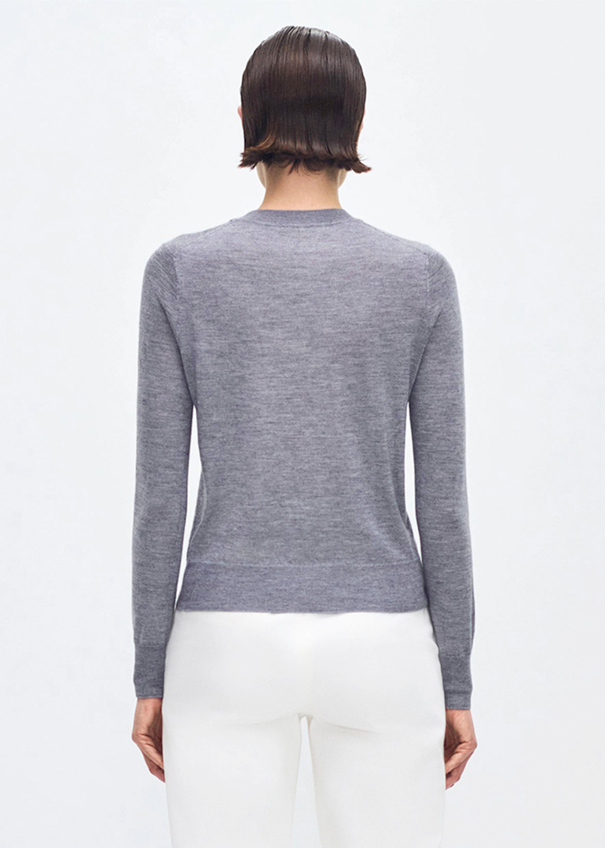 back profile of model wearing the Didion knit in cashmere silk in grey