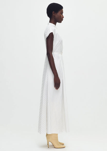 model wearing the DEJEUNER DRESS IN STRIPE POPLIN in pale white