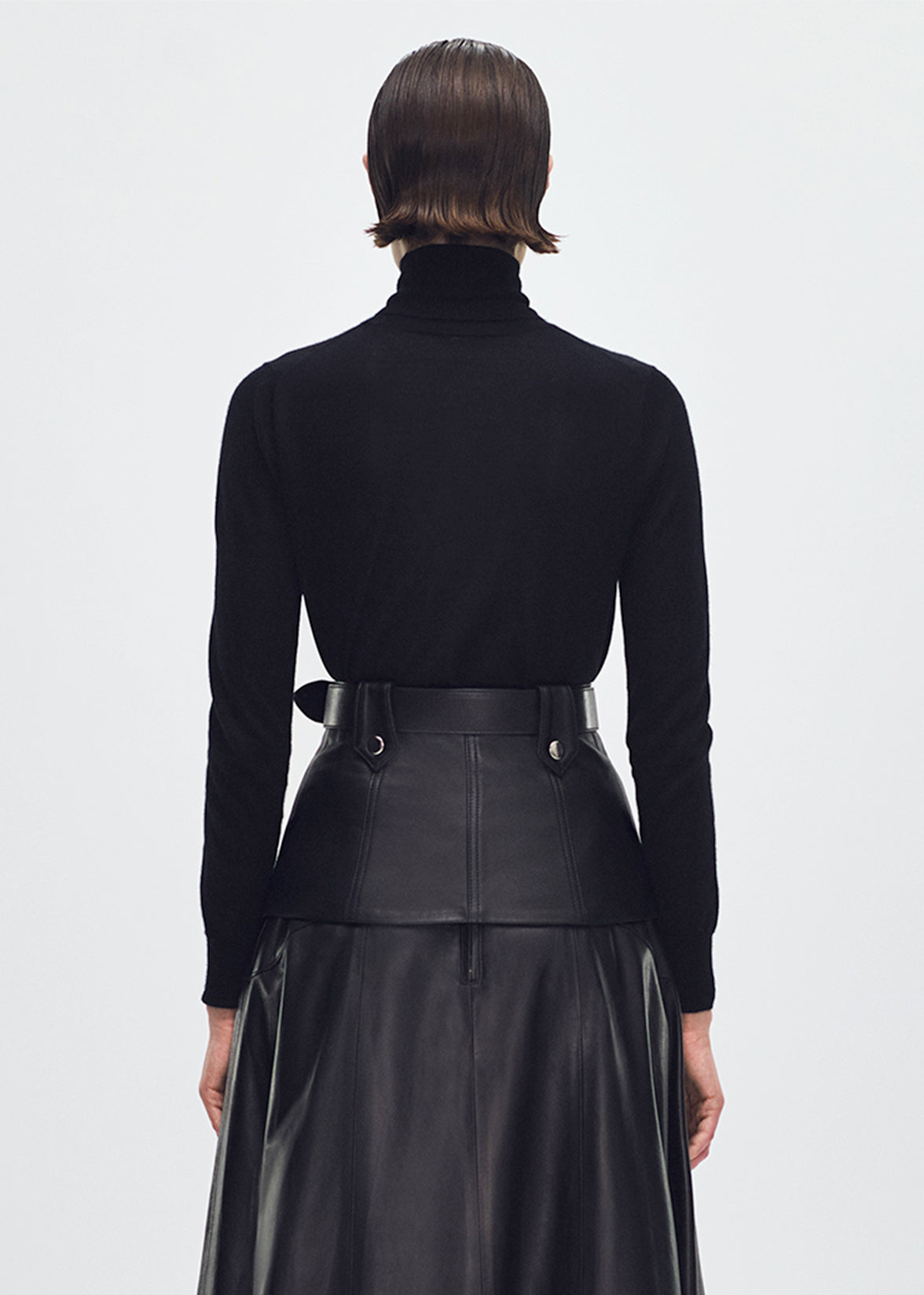 back profile of model wearing the Eve Knit in cashmere knit in black