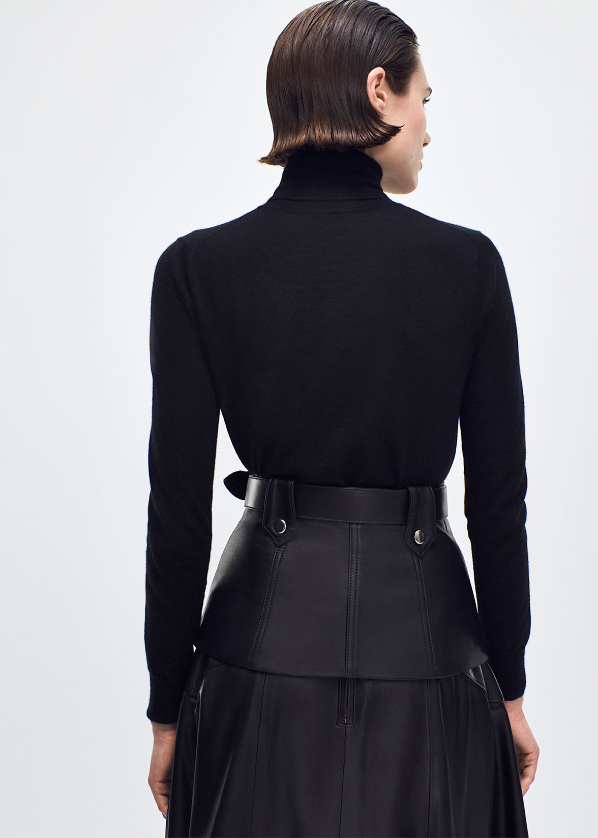 back profile of model wearing the Gael Belt in Black Leather