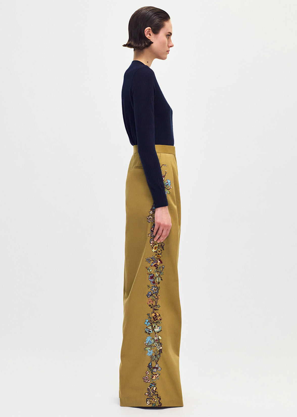  model wearing the Nils Pant in Embroidered Cotton Twill