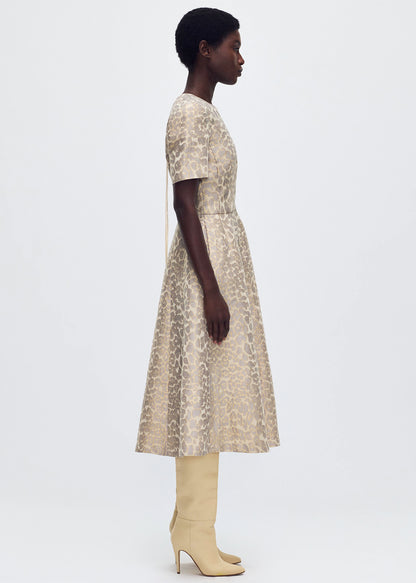 side profile of model wearing the Evangeline Dress in Leopard Jacquard