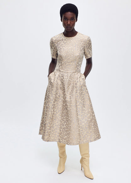 front profile of model wearing the Evangeline Dress in Leopard Jacquard