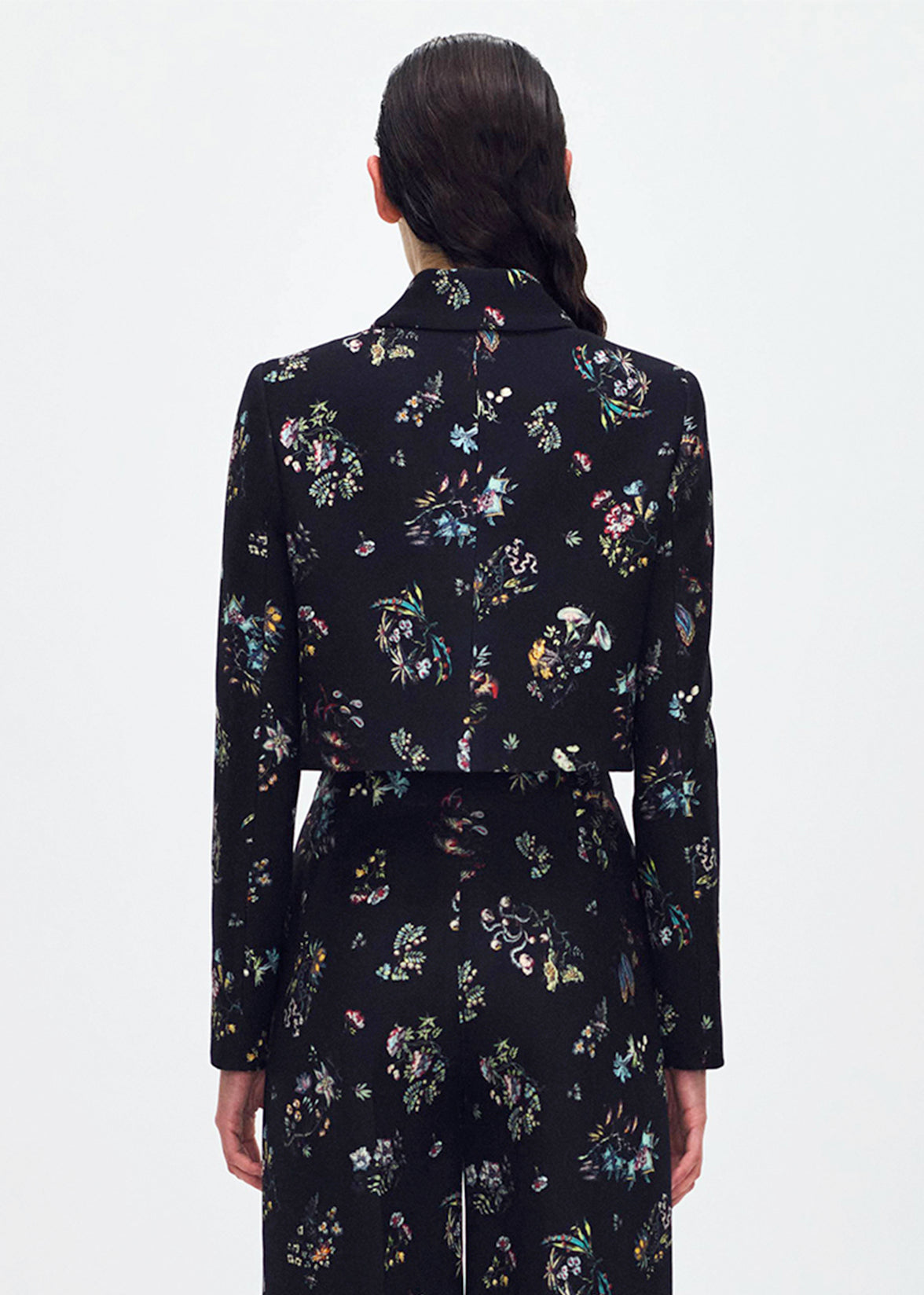 back profile of model wearing the cecil jacket in printed silk wool in black