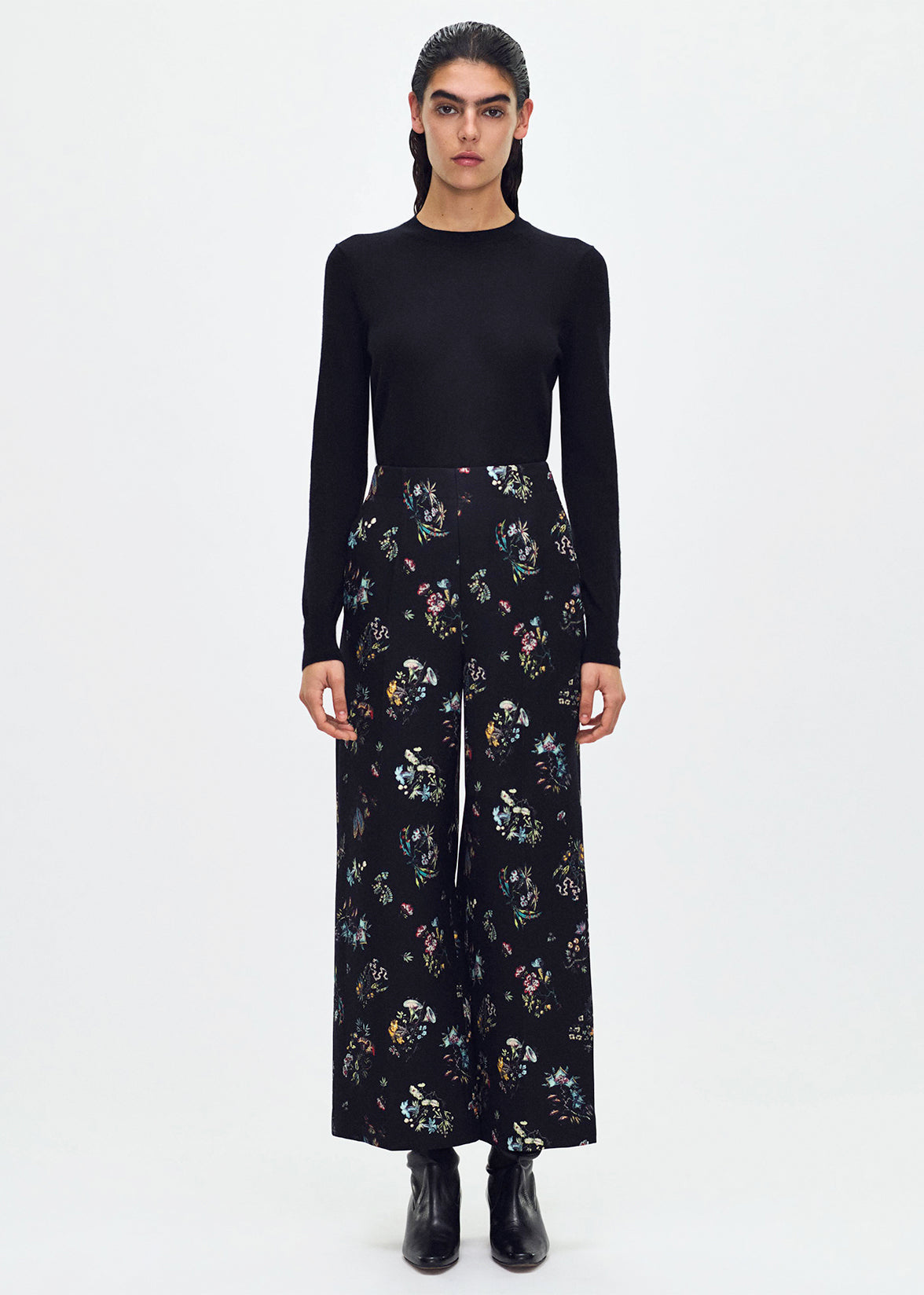 front profile of model wearing the Callen Pant in Black Floral