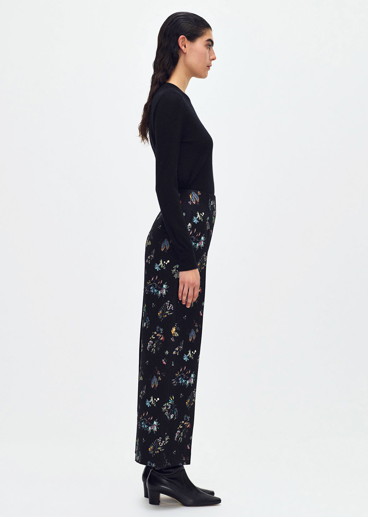 side profile of model wearing the Callen Pant in Black Floral