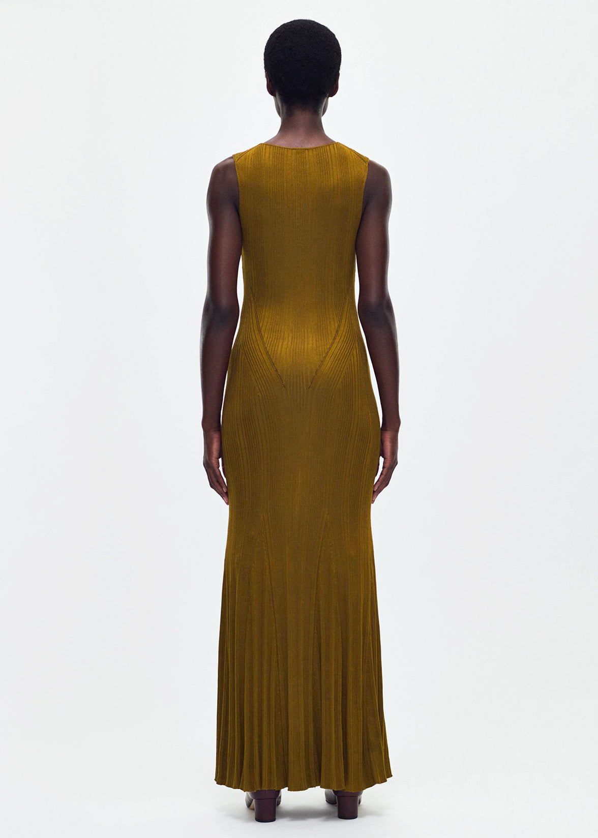 back profile of model wearing the Vivian Dress Engineered Rib in Bronze