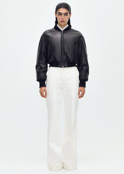 front full body profile of model wearing the Bomber Jacket in Black Leather