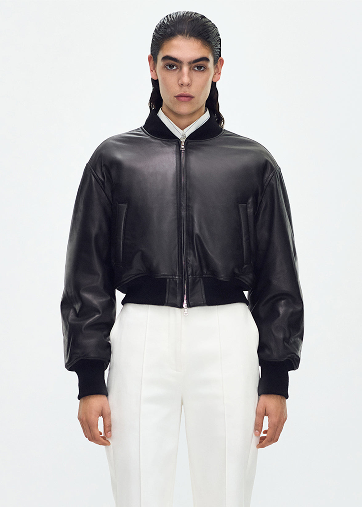 front profile of model wearing the Bomber Jacket in Black Leather