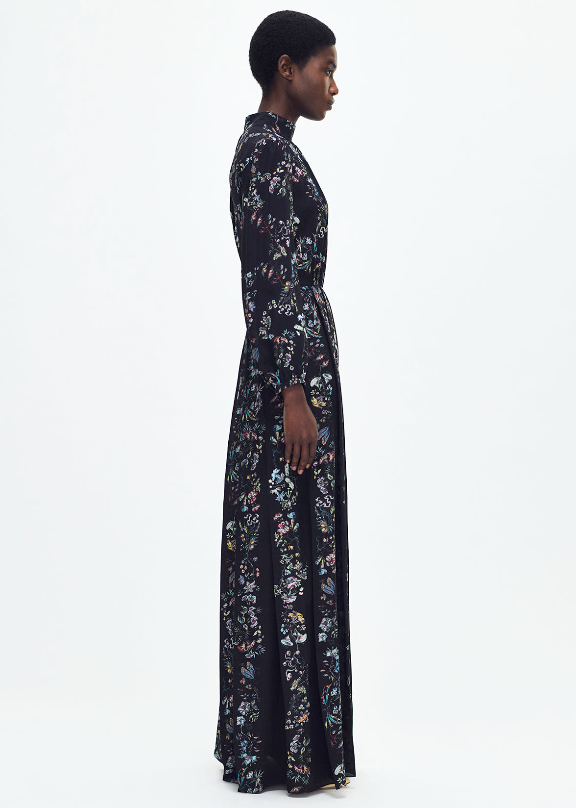 side profile of model wearing the Emilia Dress Crepe De Chine in Black Floral