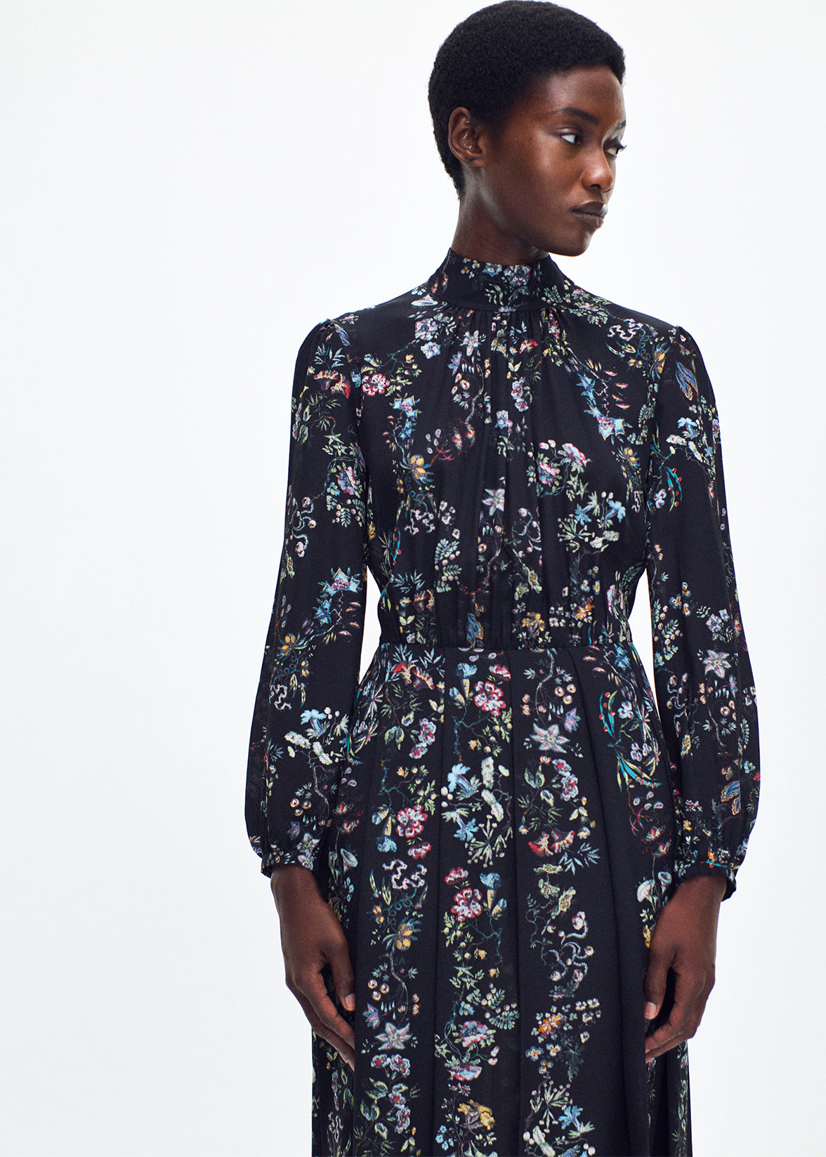 close up profile of model wearing the Emilia Dress Crepe De Chine in Black Floral