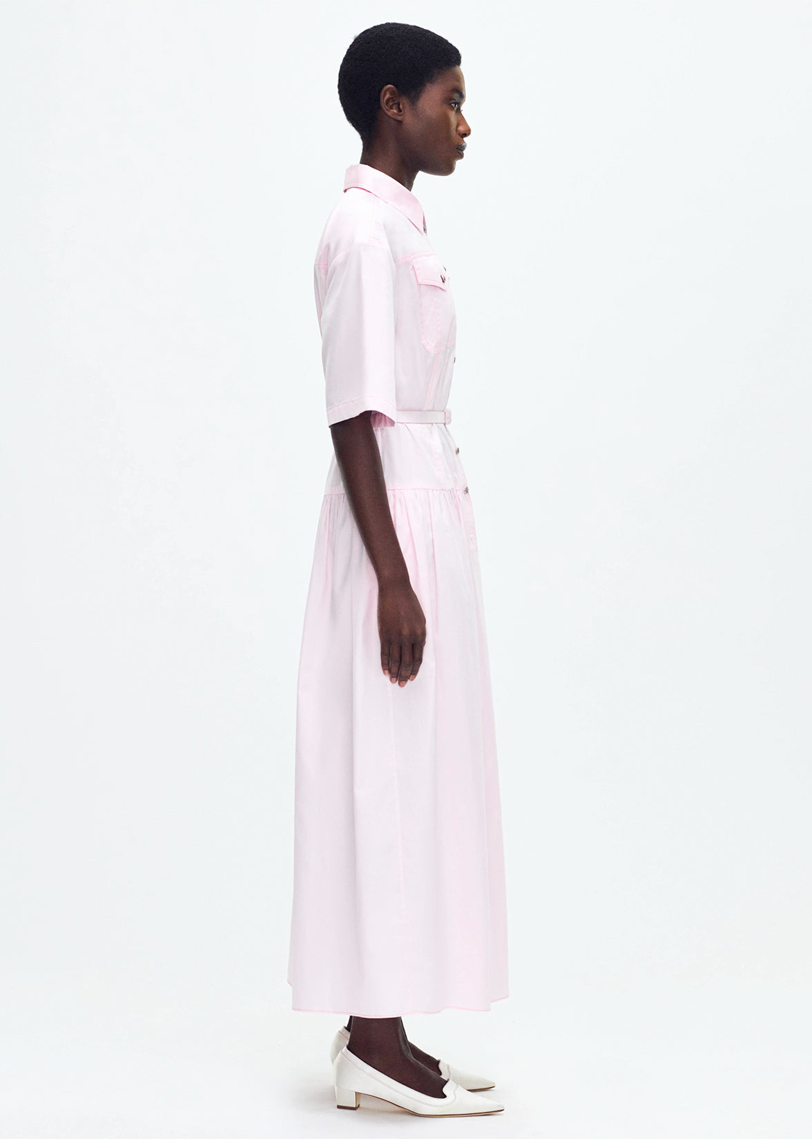 model wearing the Edie Dress in Cotton Twill khaki in pale pink