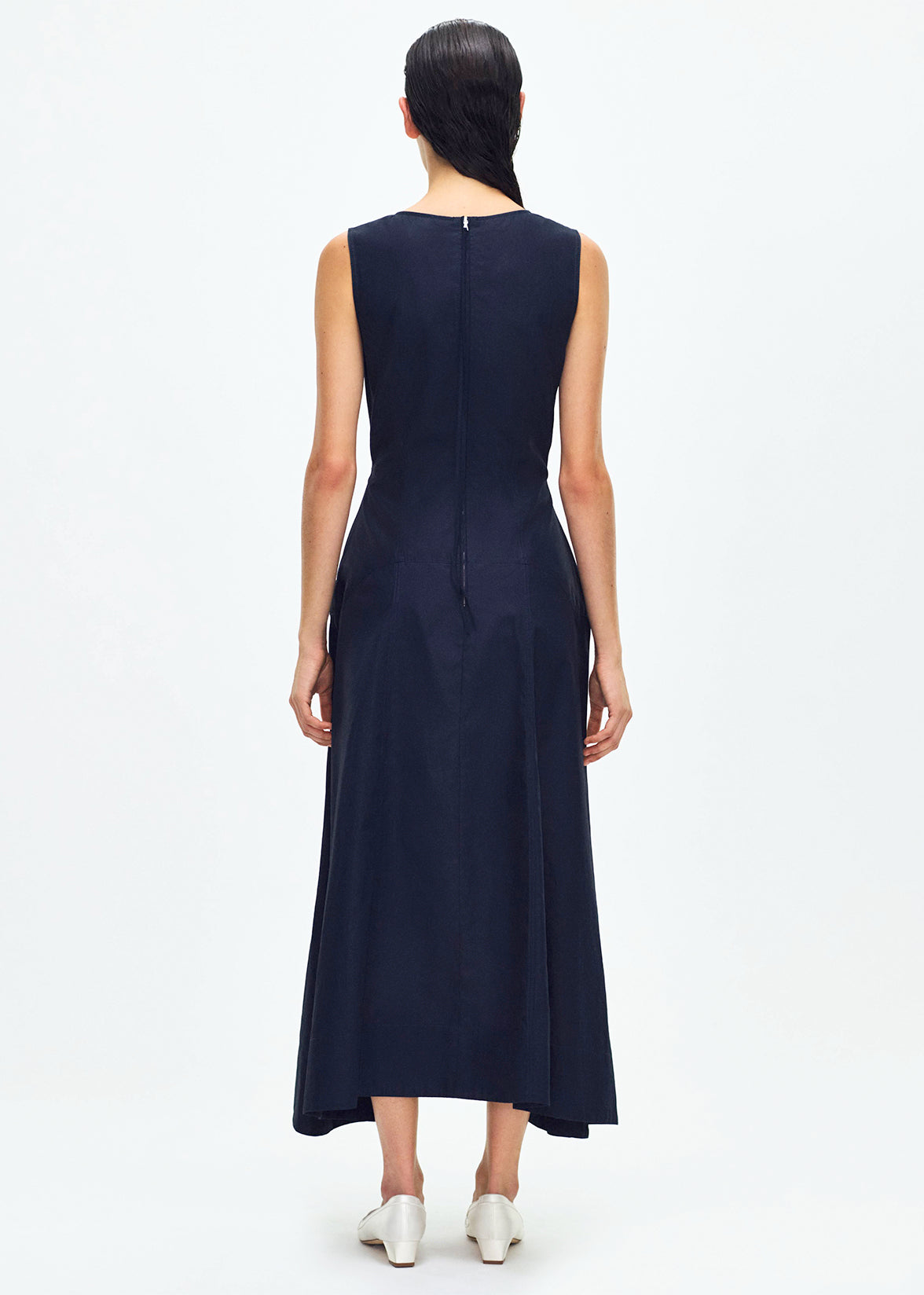 back profile of model wearing the Harlow dress in navy