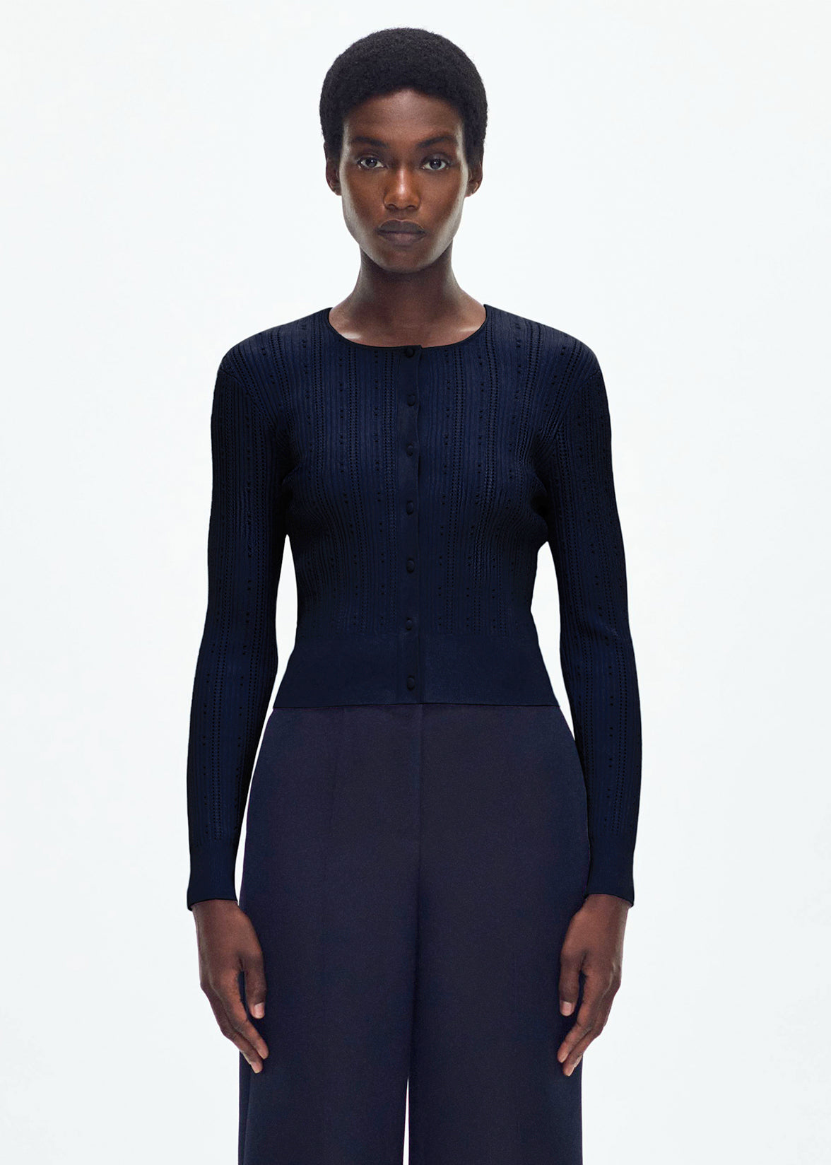 model wearing the faye cardigan in navy