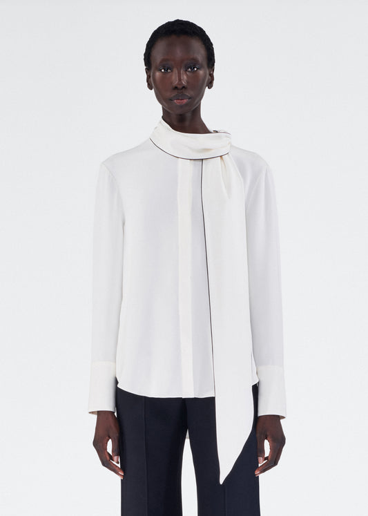 on-figure model wearing lee blouse by adam lippes in silk crepe in ivory