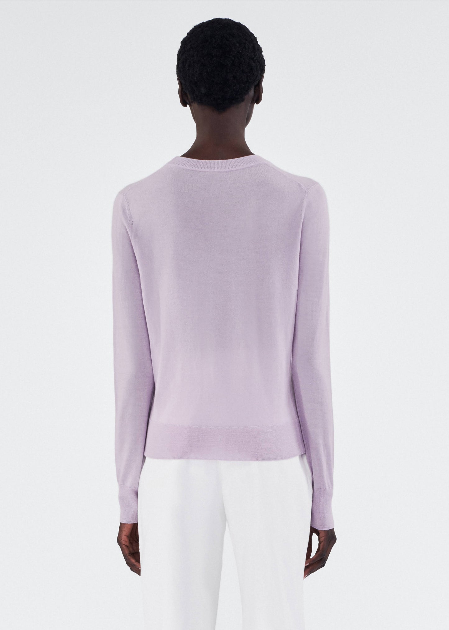 Back of model wearing Crewneck Sweater in Cashmere Silk in Lilac