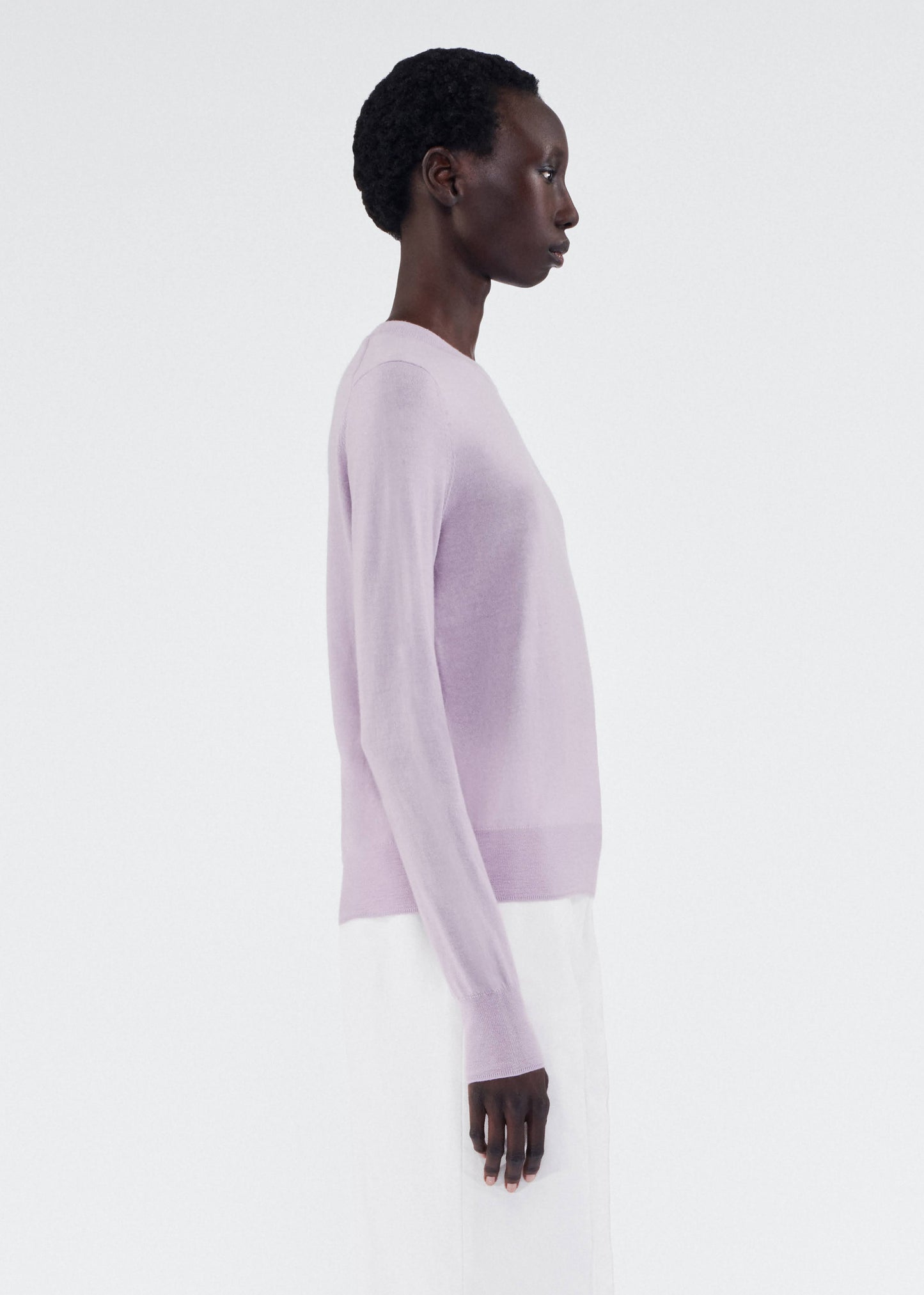 Side of model wearing Crewneck Sweater in Cashmere Silk in Lilac