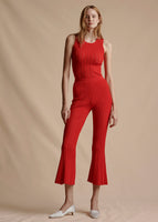 Model is wearing the Cropped Pant in Pointelle Knit in Red with the matching Red Shell Top.