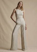 Model is wearing the Bettina Pant in Metallic Tweed paired with the Shell in Ivory in SIlk Cashmere.