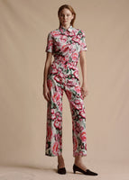 Model is wearing the Alessia Pant in Ivory Floral in Cotton Twill with the matching Trapeze Shirt tucked in.