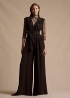 The model is wearing the Nansi Jumpsuit with the black Chantilly Lace Turtleneck underneath. 