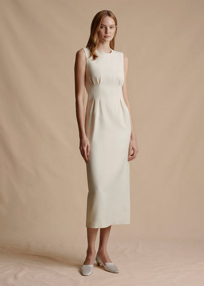 front profile of the model wearing the Ophelia Dress in Silk Wool in ivory