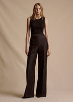 Model is wearing the black Shell in Silk Cashmere Ribbed Knit with the Bettina Pant in black.
