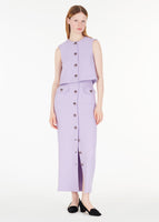 model wearing the dakota skirt in wool crepe in lavender with the matching remo top.